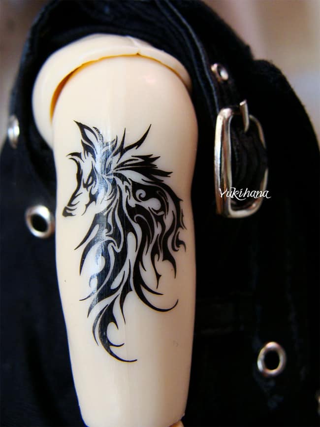 Amazing Howling Wolf Tribal Tattoo for Girls