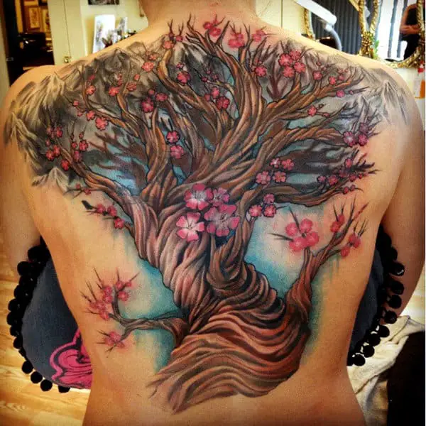 flowers-tree-cover-up-tattoo-ideas-for-back