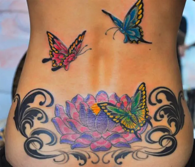 lower-back-cover-up-flying-butterfly-and-lotus-flower-tattoos