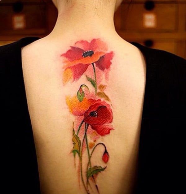 superb-female-flower-tattoo-design-on-back