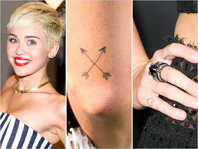 2. The Meaning Behind Miley Cyrus' Finger Tattoos - wide 3