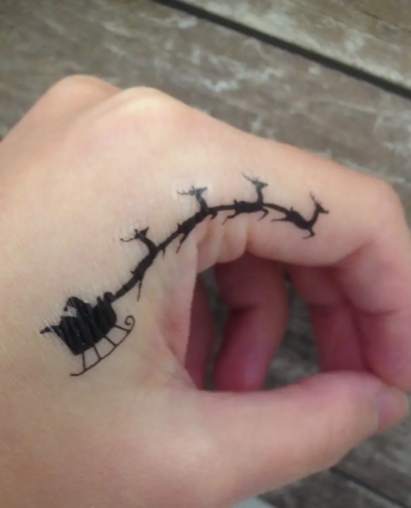 15 Superlative Christmas Tattoo Designs SheIdeas