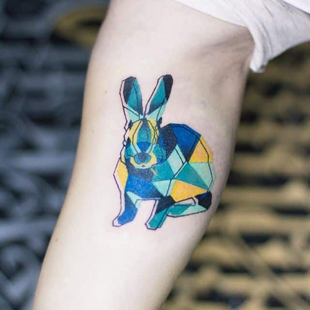 best rabbit outline tattoo on leg SheIdeas