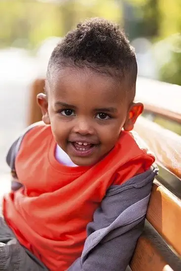 cute faded curls hairstyle for baby boy