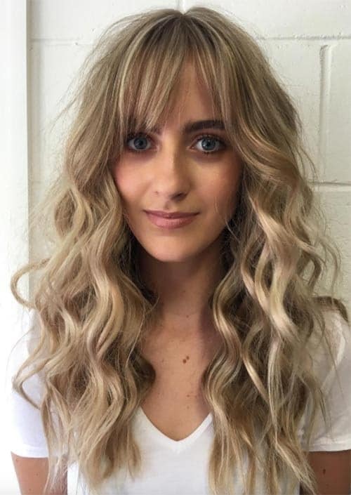 blonde curls with bangs