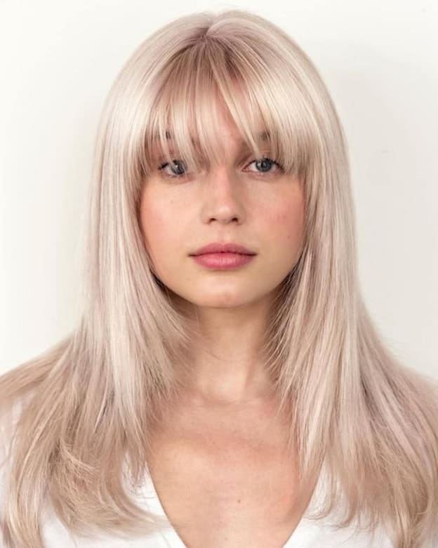 platinum blonde hair with long bangs