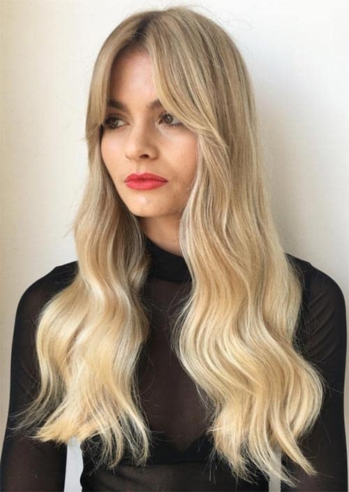 long blonde wavy hair with bangs