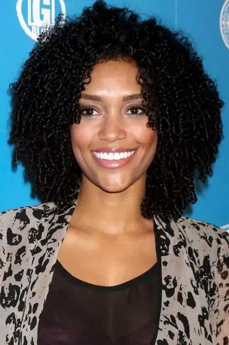 Afro curls with short bangs