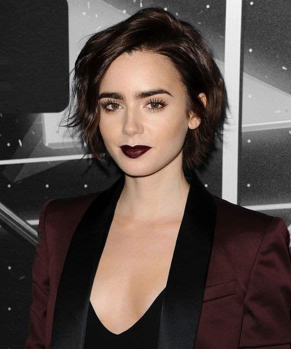 women with dark lips and burgundy dress