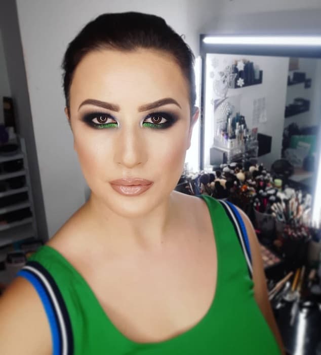 smokey eye makeup with green hues